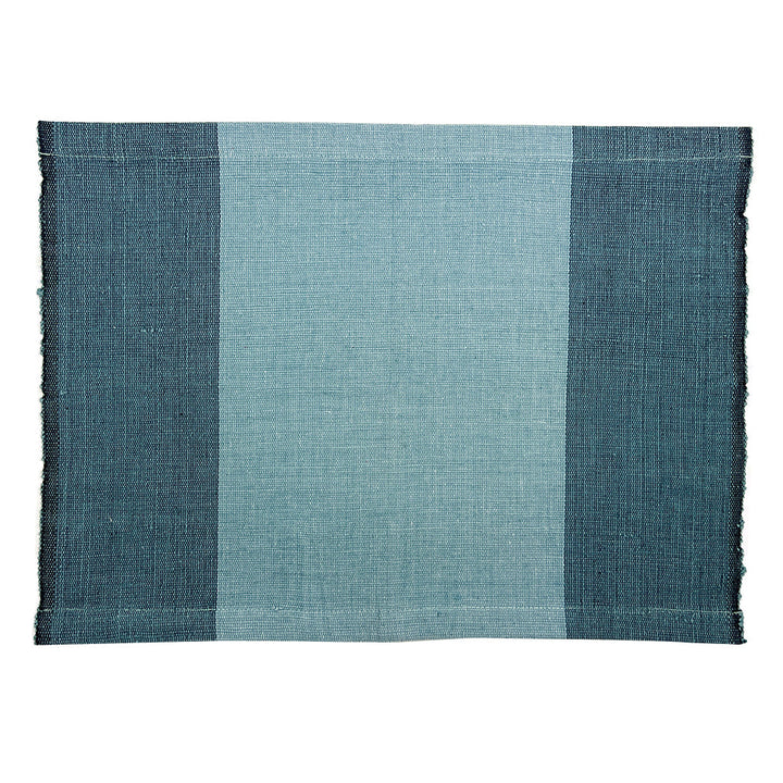 Handwoven cotton color block placemat set with stone and vibrant color blocks.