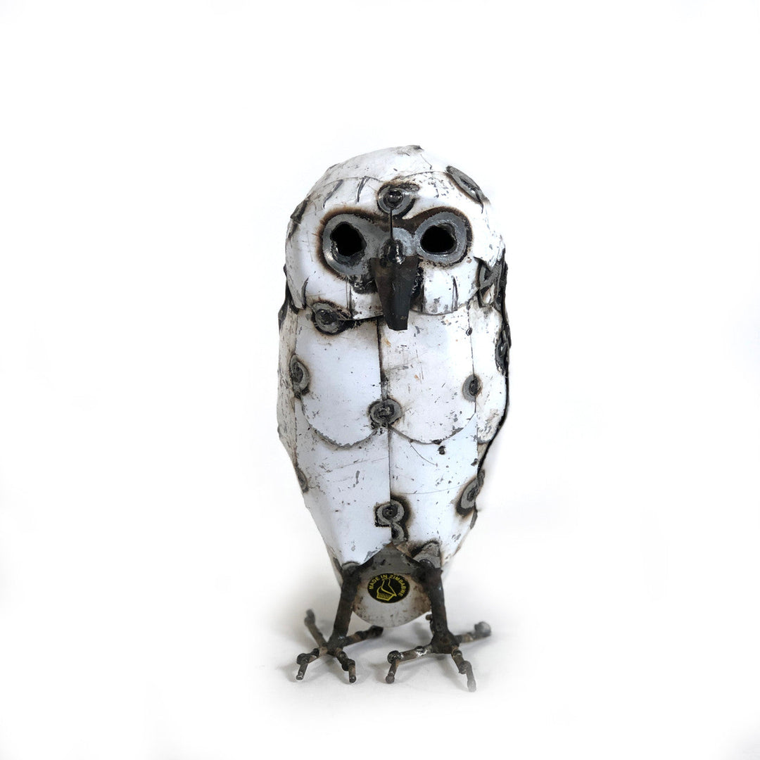 Recycled metal snowy owl sculpture with detailed metalwork and rustic finish.