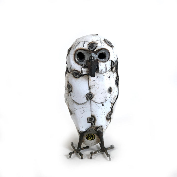 Recycled metal snowy owl sculpture with detailed metalwork and rustic finish.