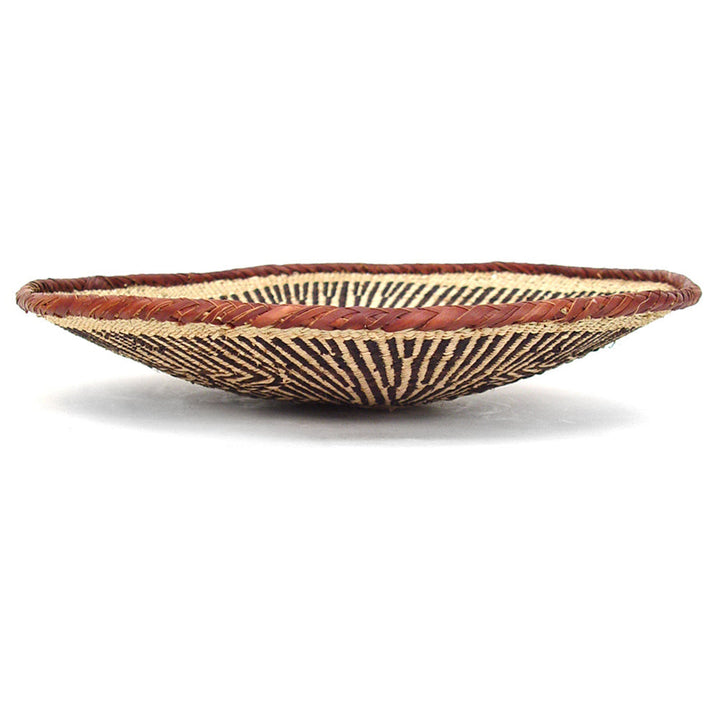 Medium Tonga basket, woven natural fiber on a neutral background.