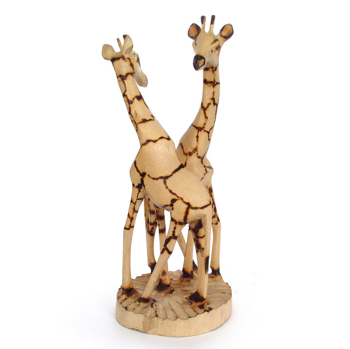 Hand-carved jacaranda wood giraffe pair with a natural wood finish.