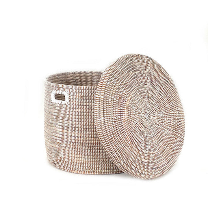 White lidded floor basket, handwoven and spacious for home storage.