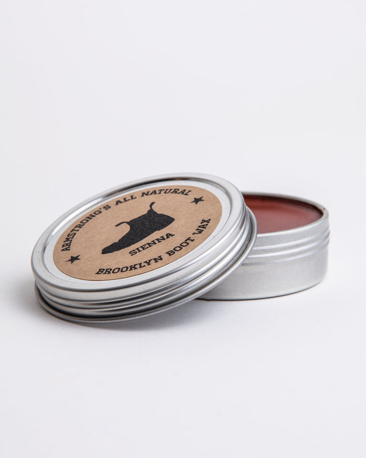 Brooklyn Boot Wax in pigmented black with an application brush.