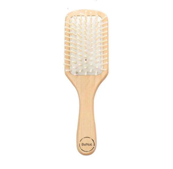Bamboo detangling hair brush with a natural bamboo handle and flexible bristles for gentle, effective hair detangling.