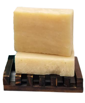 Natural frankincense and myrrh soap bar with earthy tones and botanical ingredients.