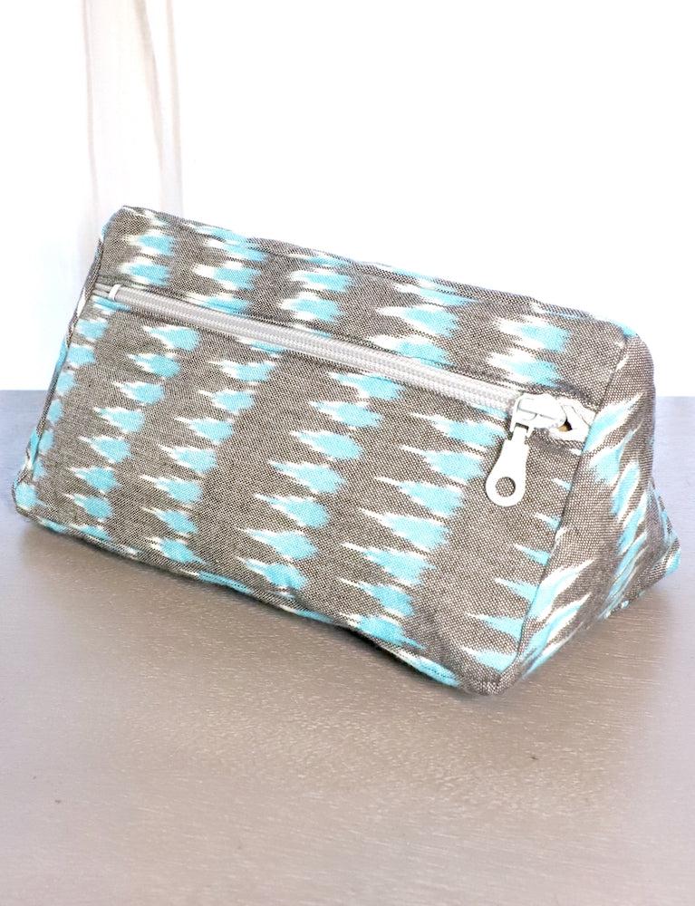 Grey and teal ikat cotton toiletry bag.