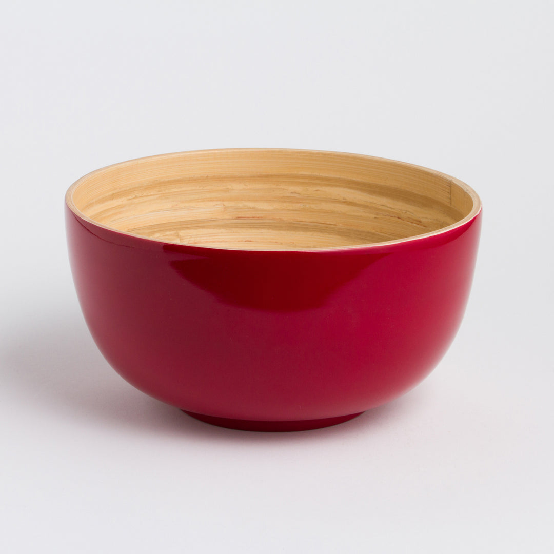 Large handcrafted bamboo salad bowl with a smooth natural surface and spacious interior.