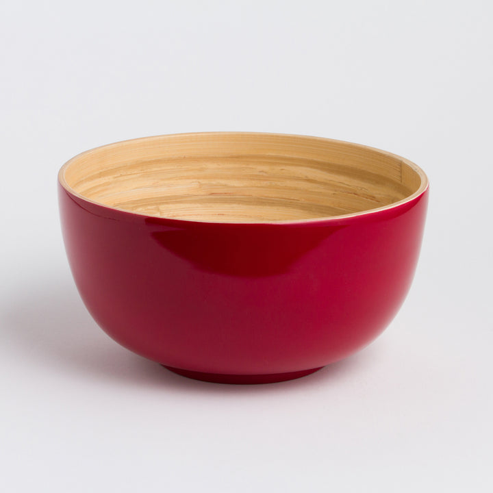 Large handcrafted bamboo salad bowl with a smooth natural surface and spacious interior.