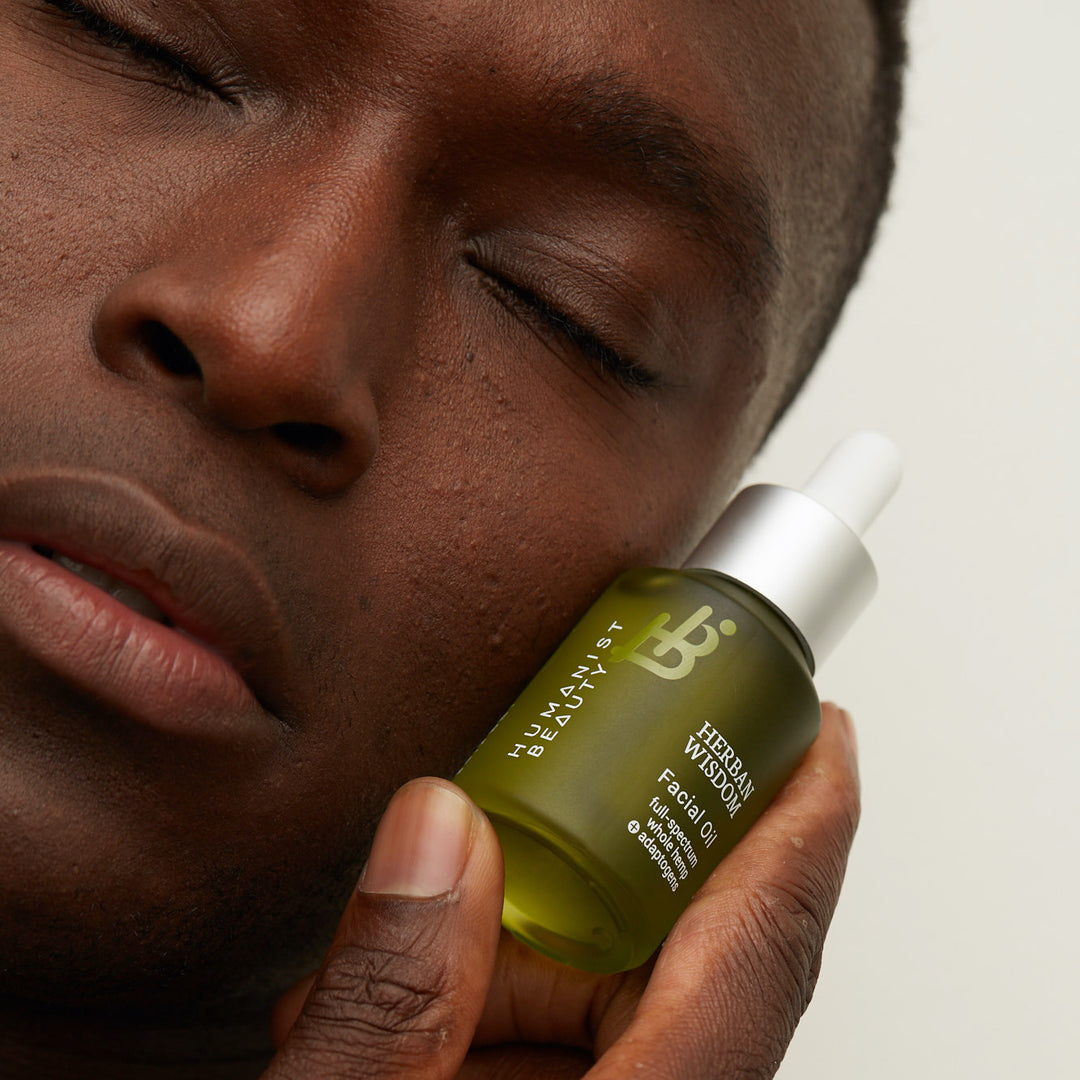 Herban Wisdom facial oil in a full-size bottle with a dropper.