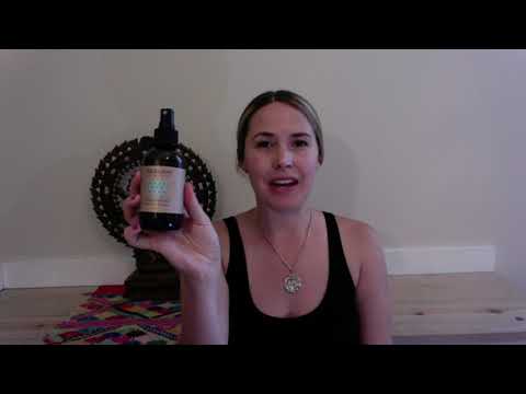 Ayurvedic aromatherapy ritual kit with essential oils on a wooden surface.