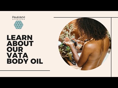 Vata body oil, Ayurvedic abhyanga massage oil, in a clear glass bottle.