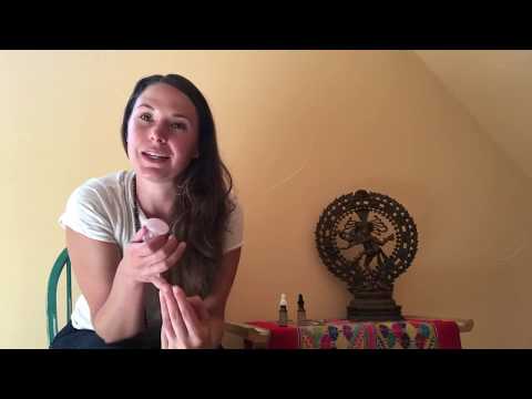 Rose quartz facial tool for facial massage.