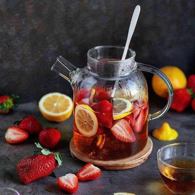 Large 54 oz glass teapot with a lid and handle, for brewing and serving tea.