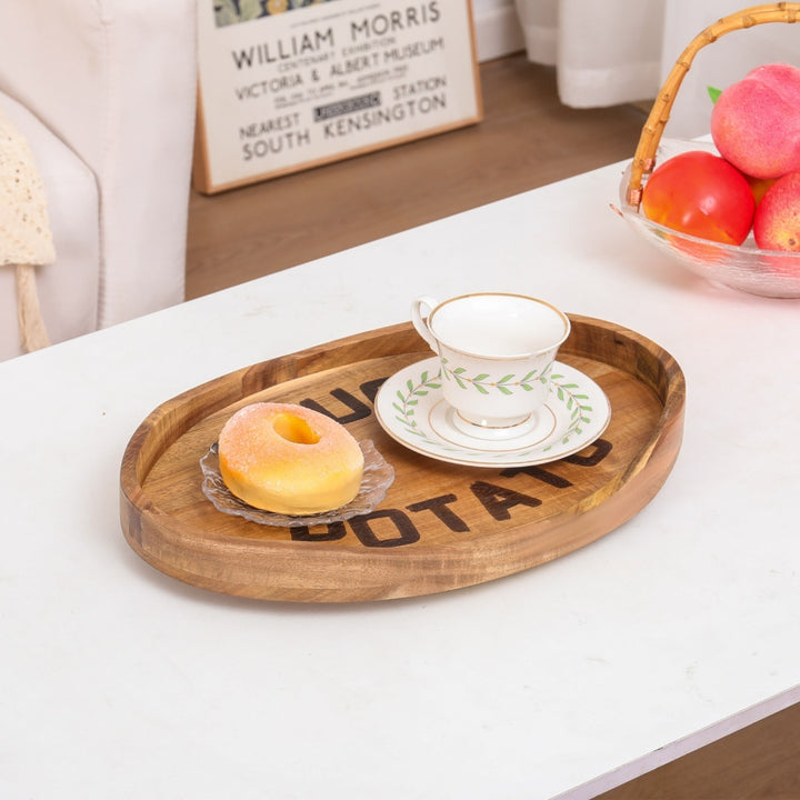 Couch Potato Clip-On Sofa Tray made of acacia wood with metal clips for secure attachment to sofa armrests.
