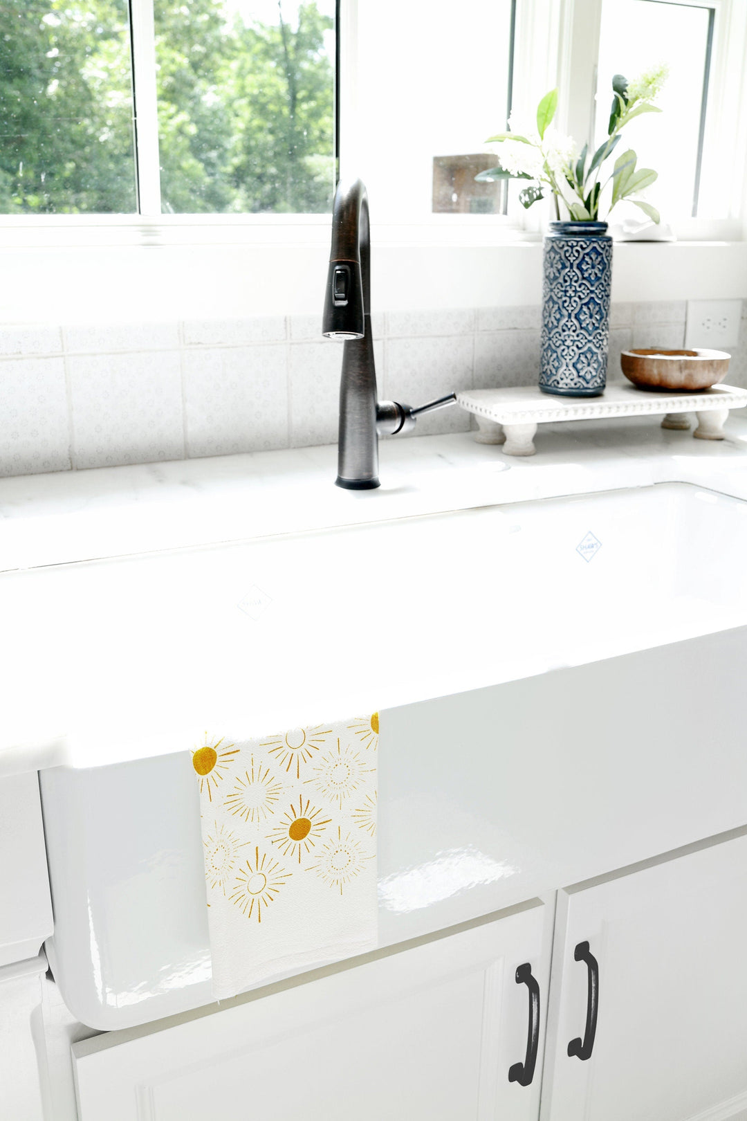 Sundance tea towel with a flowing watercolor pattern on cotton.