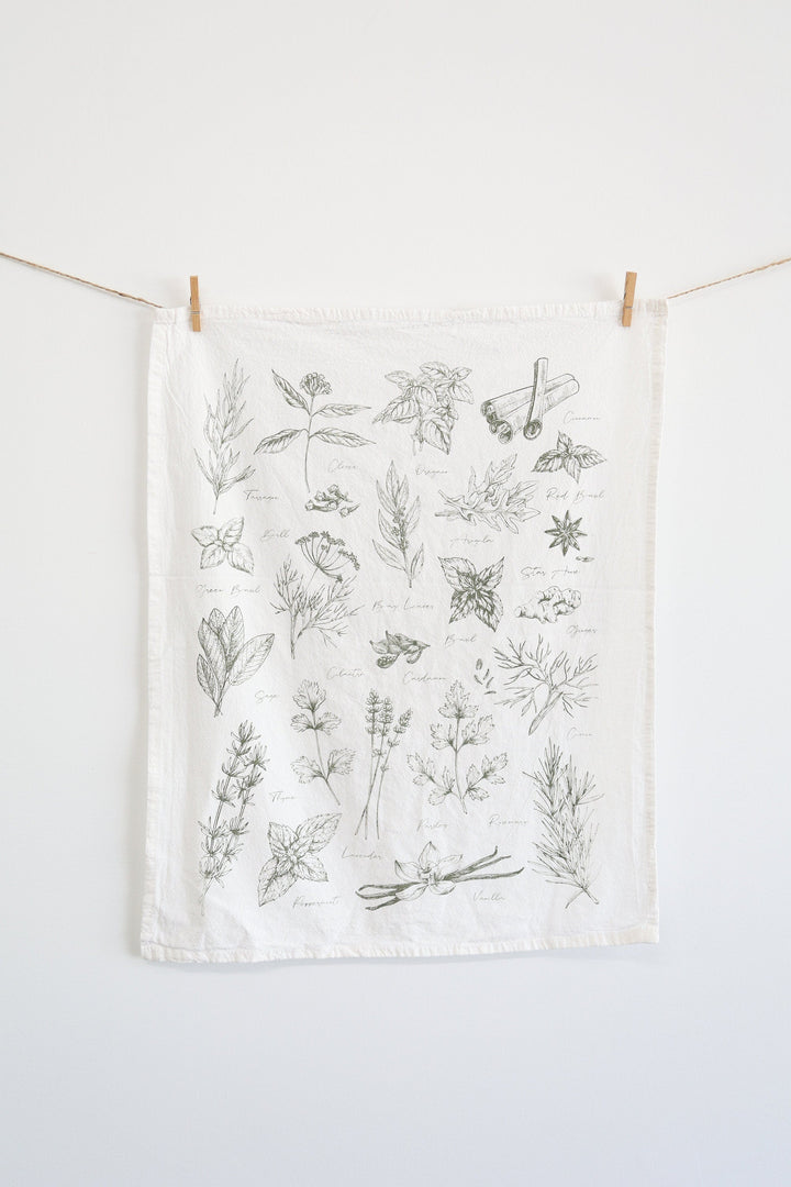Kitchen herbs tea towel with watercolor herb illustrations on cotton.