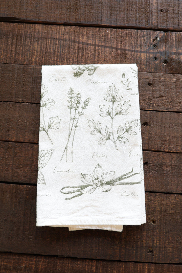 Cotton kitchen tea towel with a watercolor herb print.