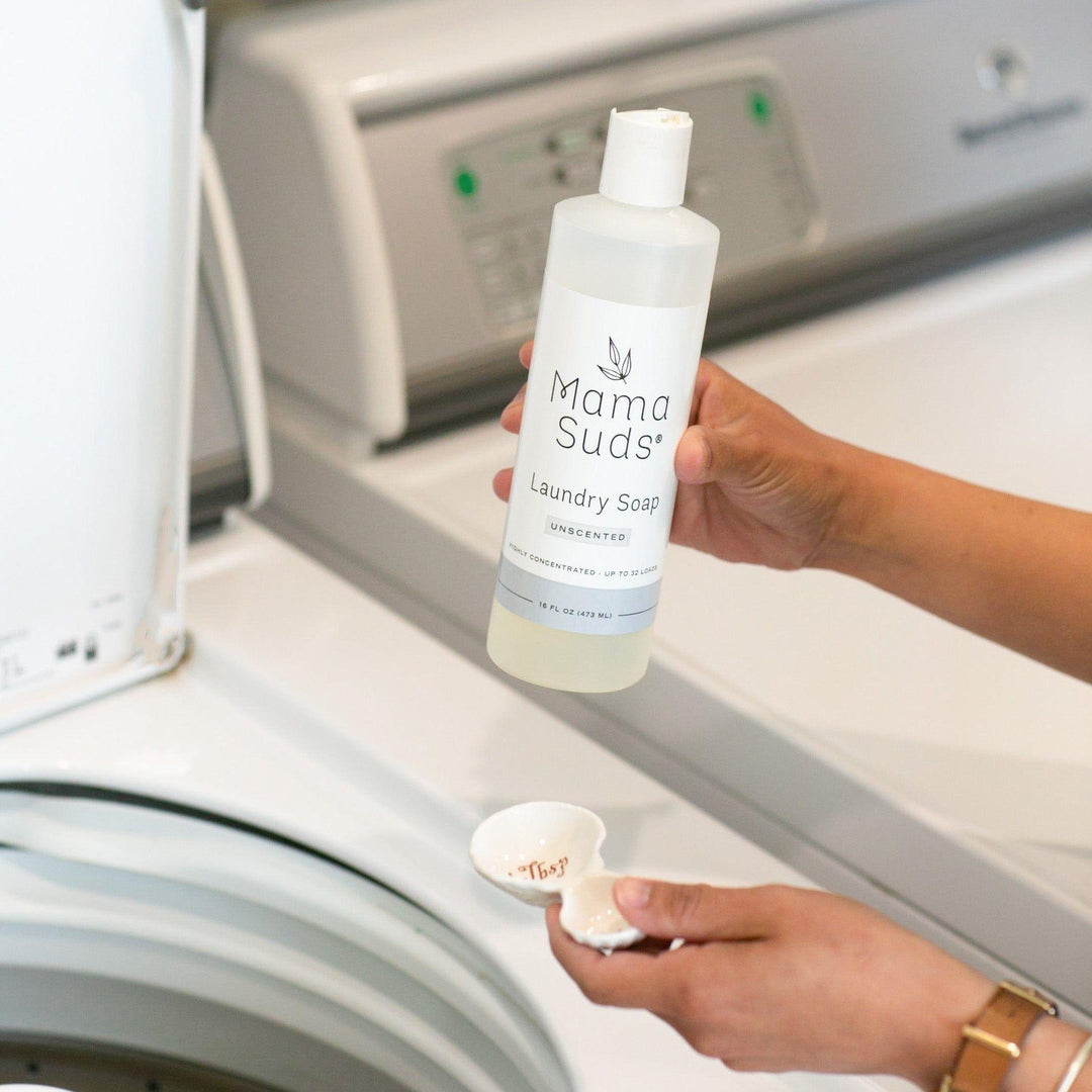 Ultra-clean laundry soap in a white bottle with a blue cap.