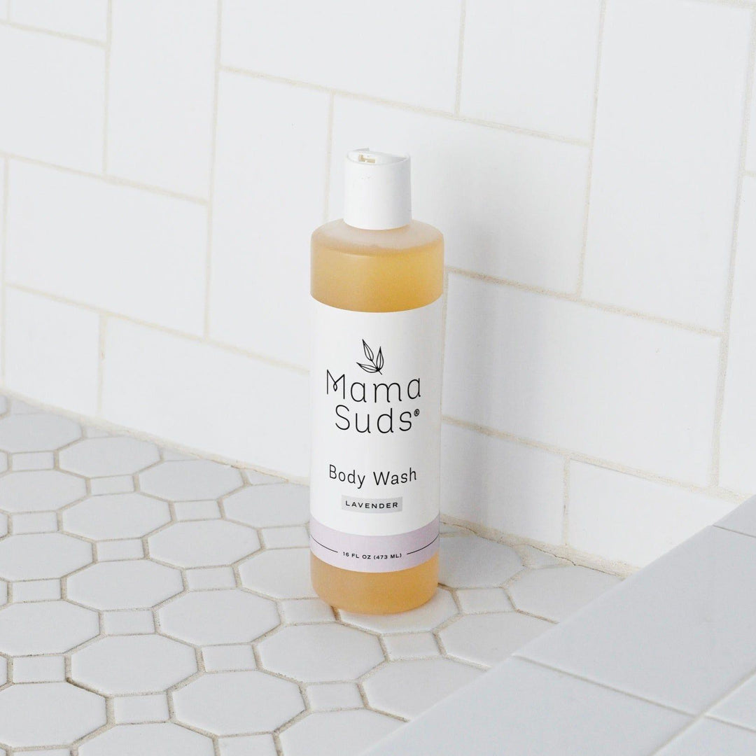 Plant-based castile body wash in a clear bottle with a light-colored liquid.