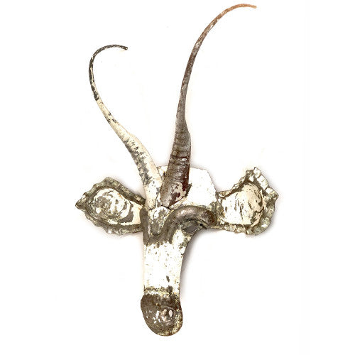 Recycled metal sable antelope mask showing intricate hand-cut metalwork.