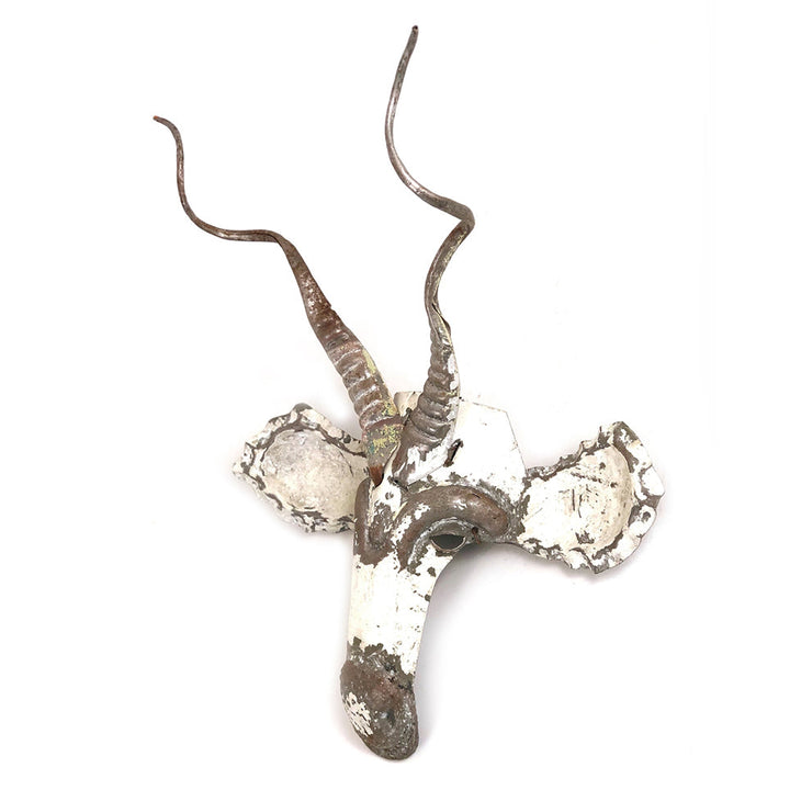 Kudu antelope wall mask in recycled car tin, a sculptural African decor piece.