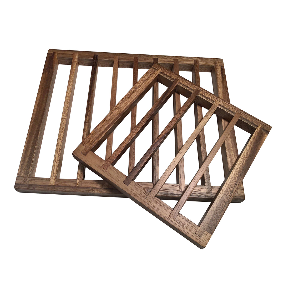 Set of acacia wood trivets with natural grain detail for hot pots and pans.