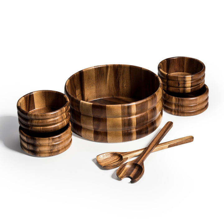 Skagen seven-piece acacia wood salad bowl set with versatile serving sizes.