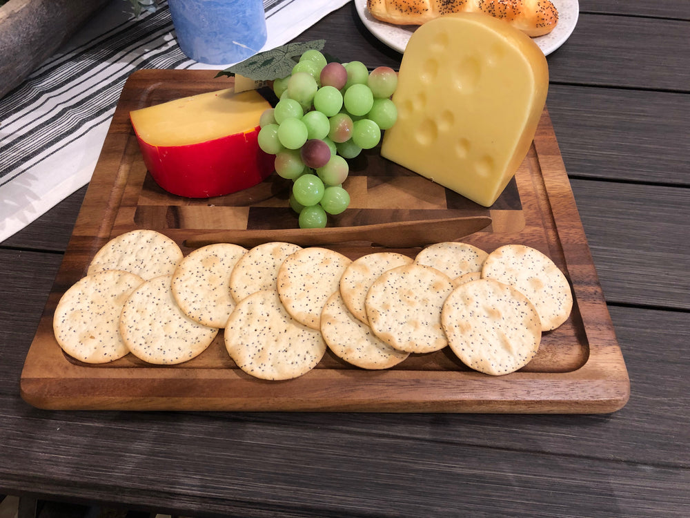 Acacia cheeseboard with matching knife for cheese and appetizers.