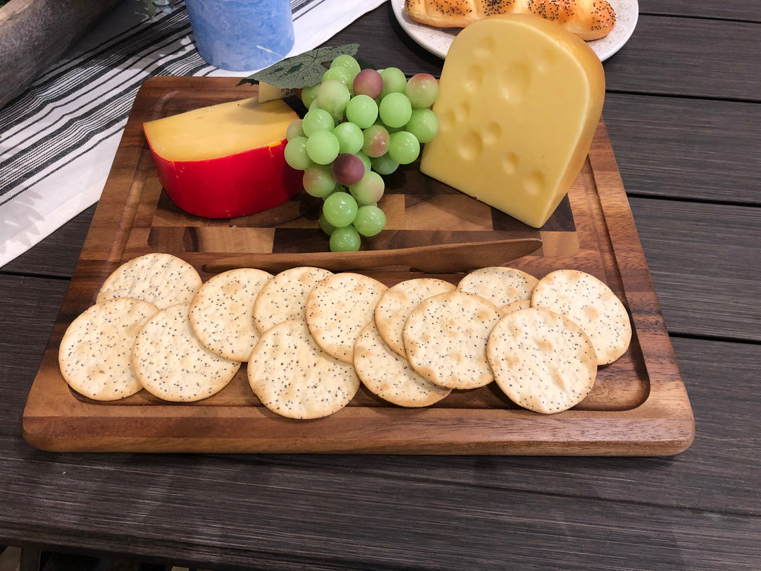 Acacia cheeseboard with matching knife for cheese and appetizers.