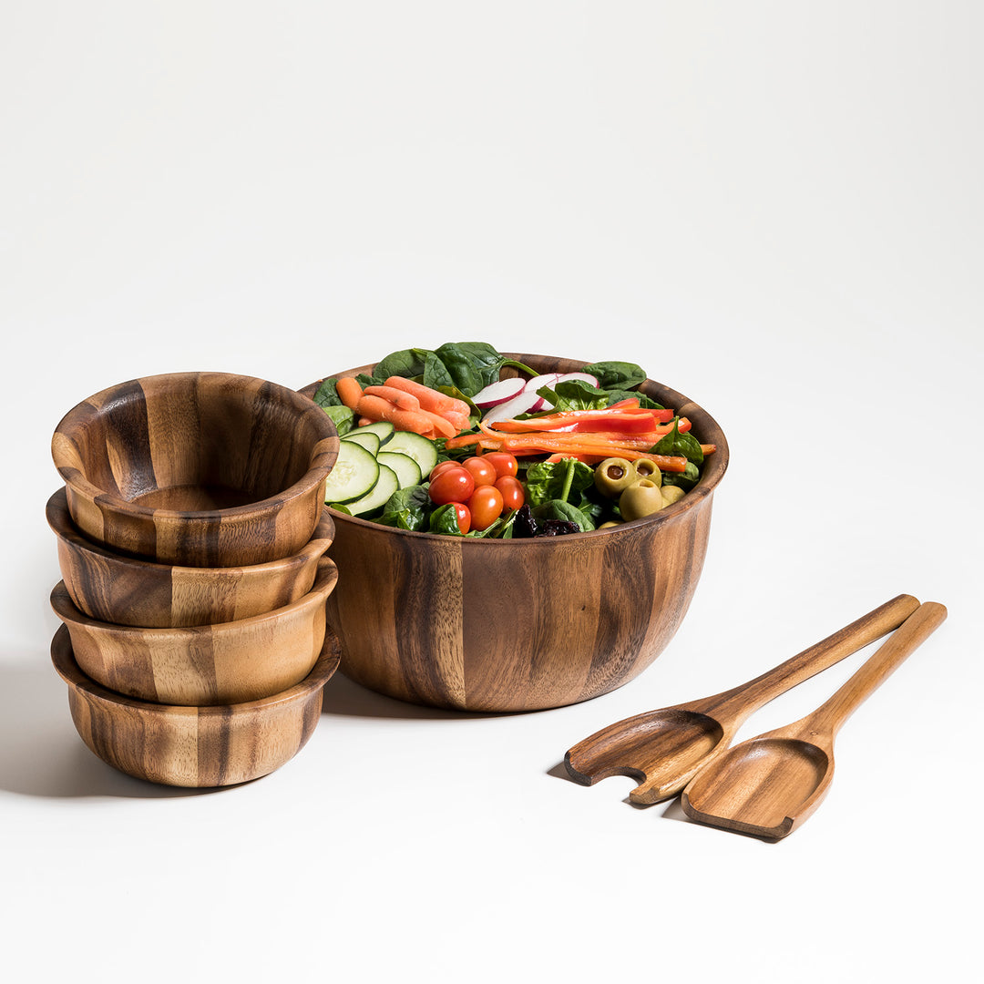 Soro acacia wood salad bowl set with a large serving bowl and matching bowls.