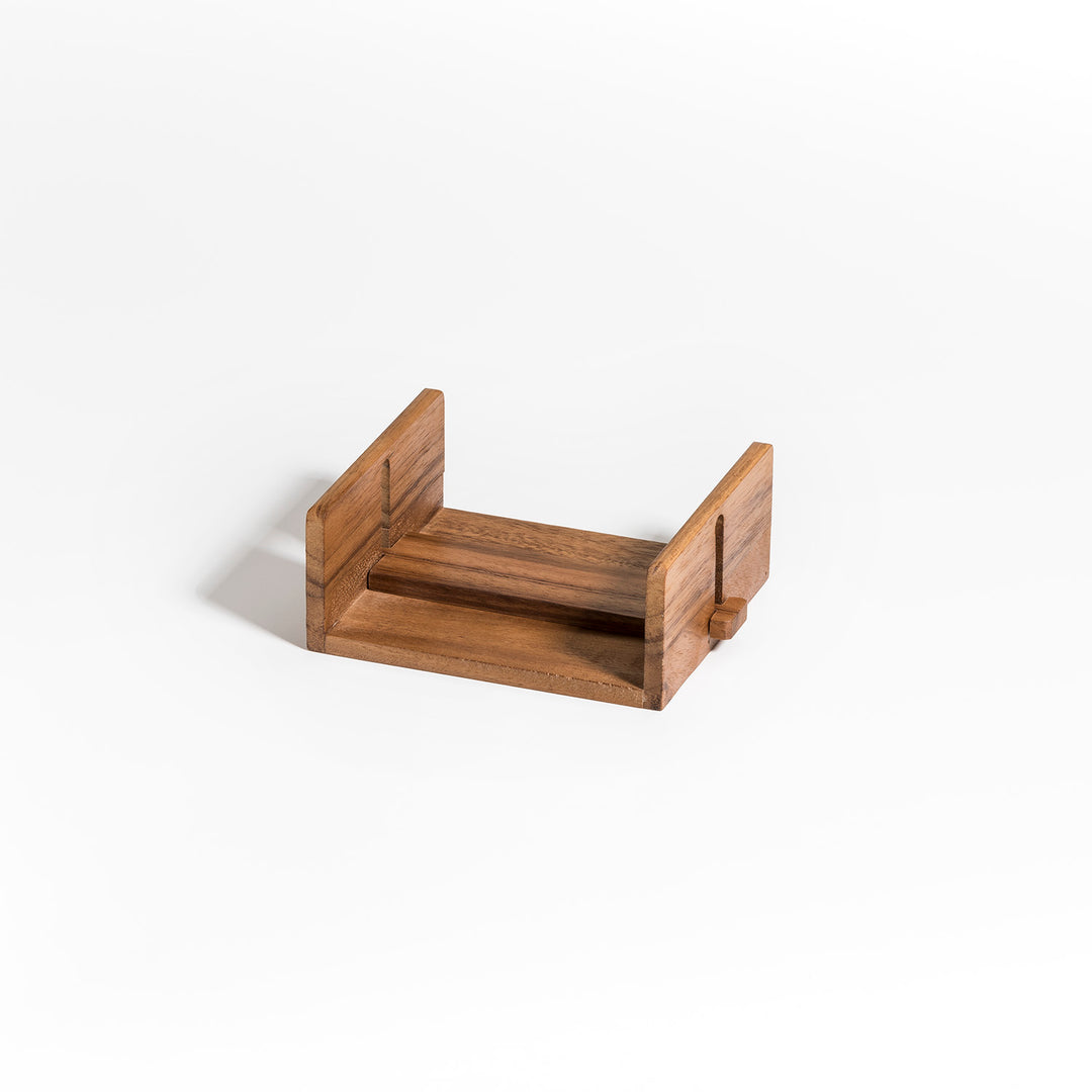 Adjustable acacia wood cocktail napkin holder with metal accents, showcasing a sleek, natural finish and modern design.