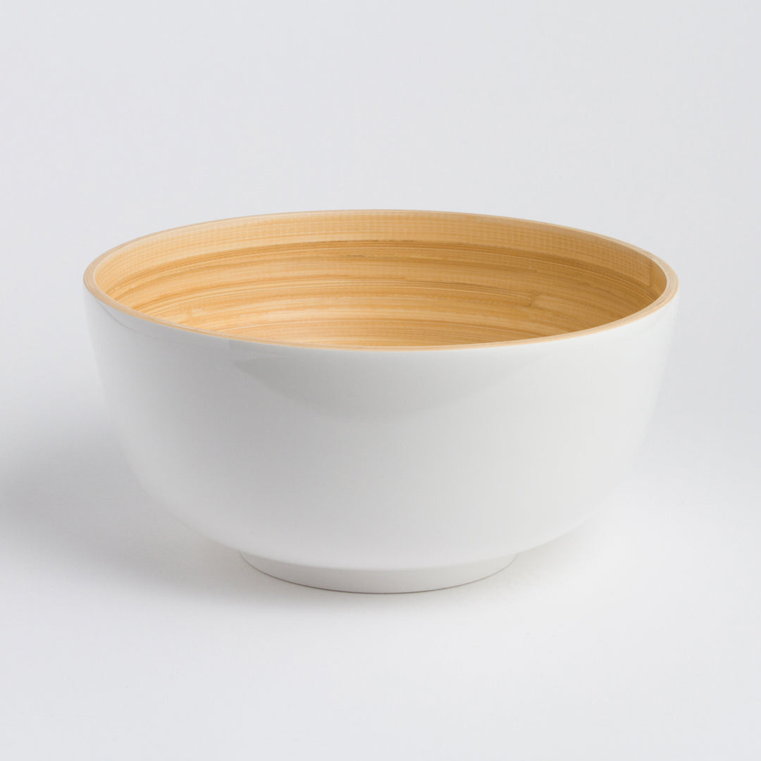 Large handcrafted bamboo salad bowl with natural grain and a spacious shape.