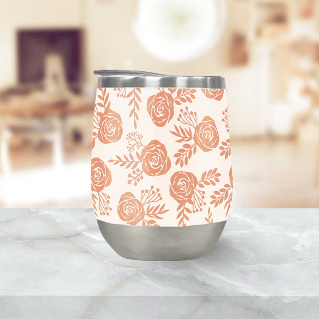 Orange rose wine tumbler with press-on lid, painted orange florals on a cream body, and stainless base.