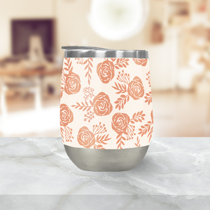 Orange rose wine tumbler with press-on lid, painted orange florals on a cream body, and stainless base.