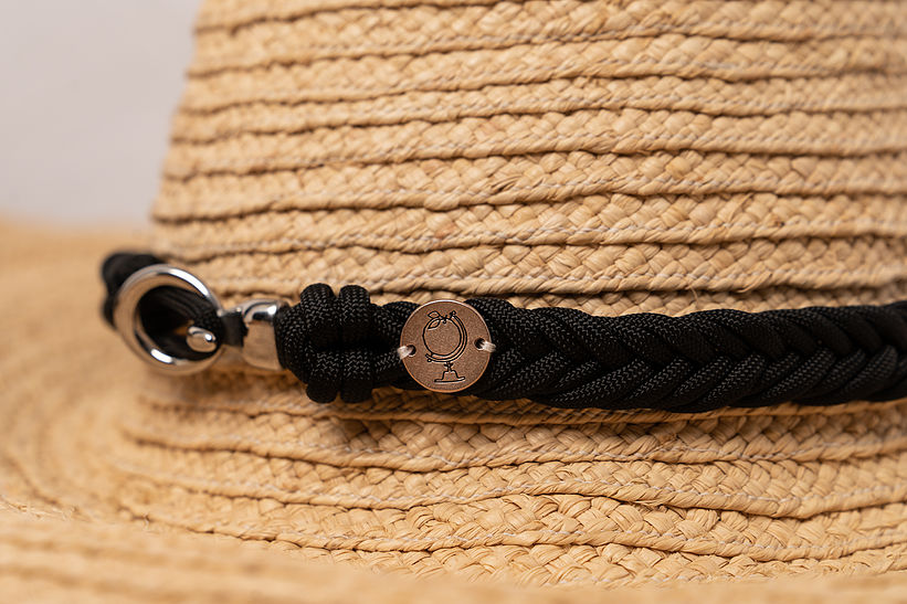 The Grand Belmont wide-brim straw sun hat shown in natural straw with a generous brim.