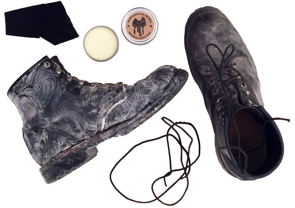 Brooklyn Saddle Soap in a tin with a brush applicator, for cleaning leather.
