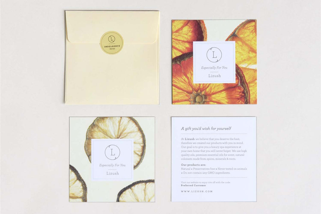 Grapefruit body oil with a citrus label and elegant packaging.