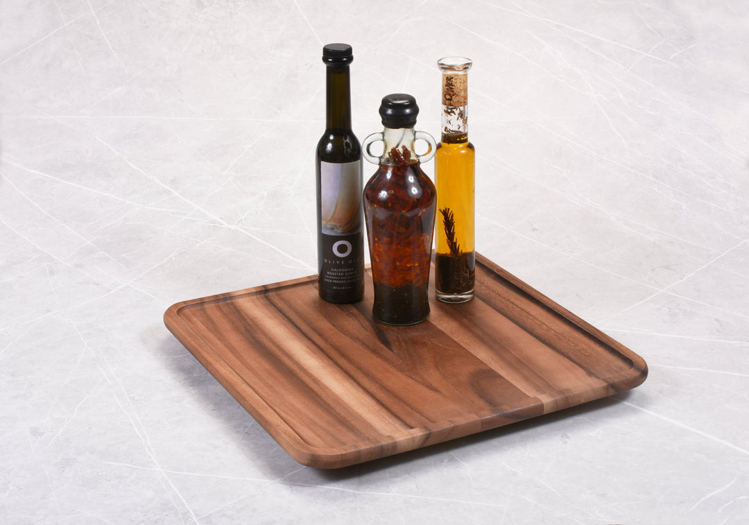 16-inch acacia wood square lazy Susan with a smooth rotating surface.