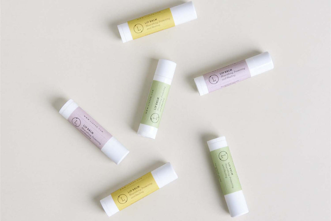 Handmade natural unscented lip balm set in simple packaging.