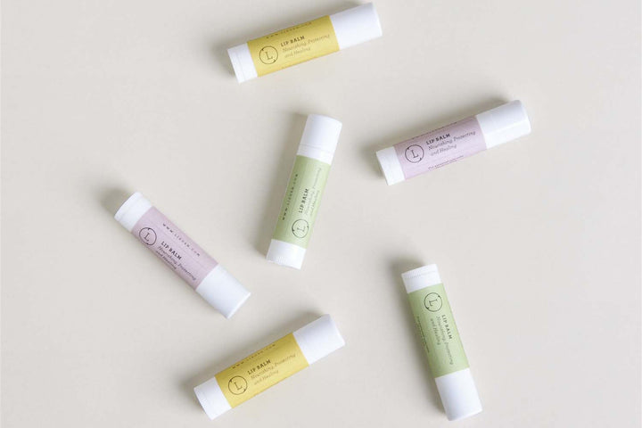 Handmade natural unscented lip balm set in simple packaging.