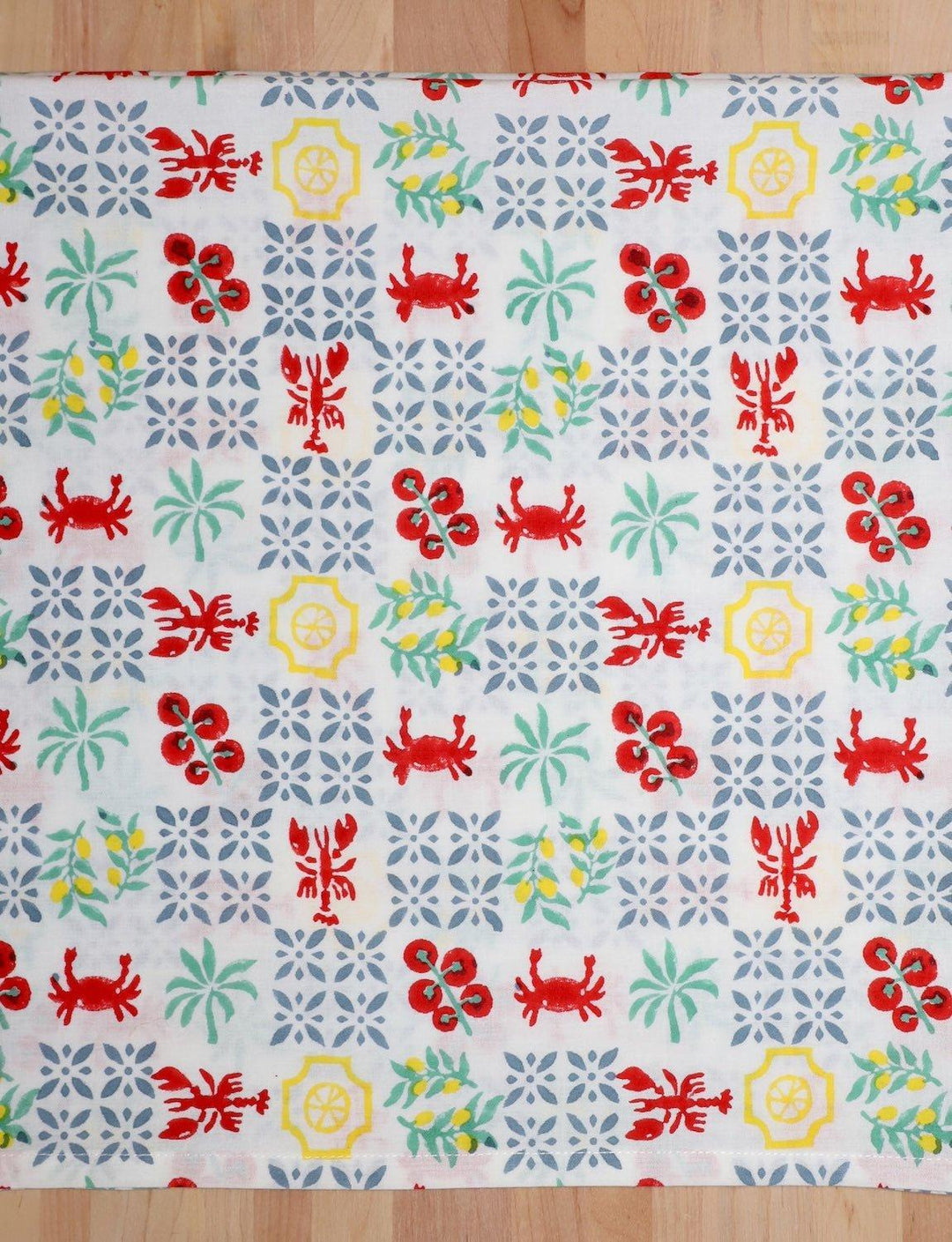 New Orleans Riviera cotton tea towel with a colorful hand block printed design.