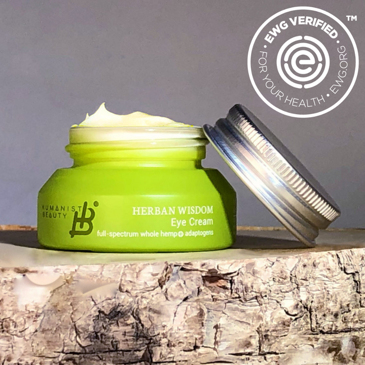 Herban Wisdom eye cream jar with a white lid and minimal label.