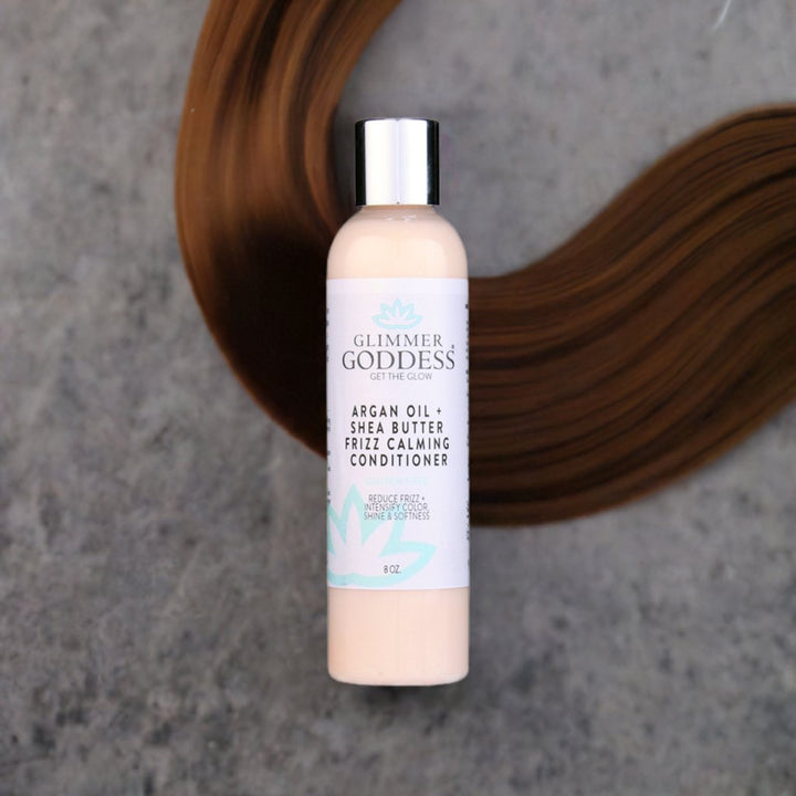 Organic argan hair conditioner with shea butter, moisturizing hair care.