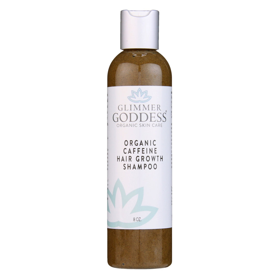 Organic caffeine shampoo with a pump dispenser in a clear bottle.