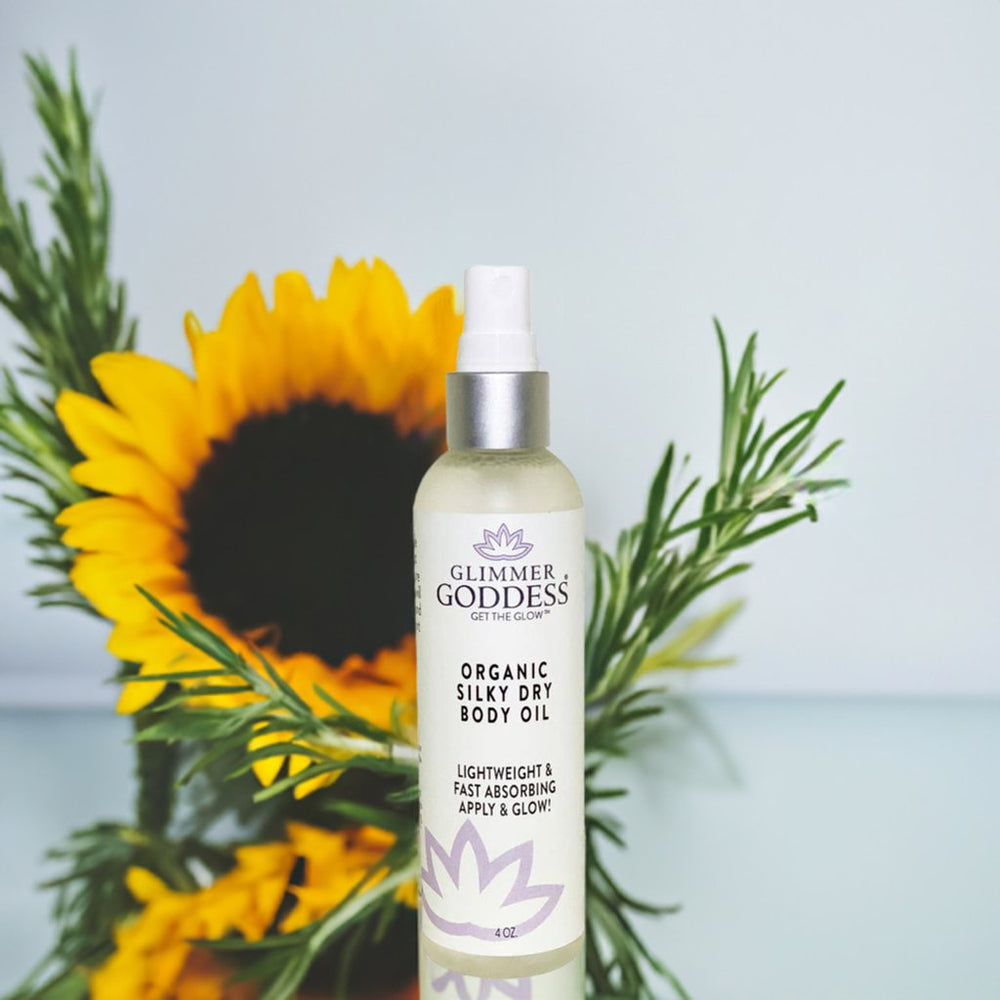 Organic silky dry body oil in a 4 oz bottle, lightweight texture.