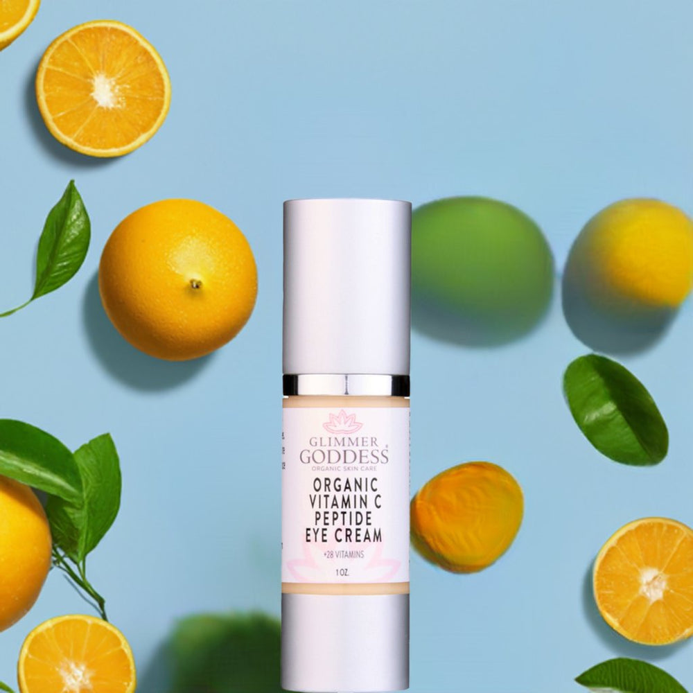 Organic vitamin C eye serum in a dropper bottle with citrus ingredients.