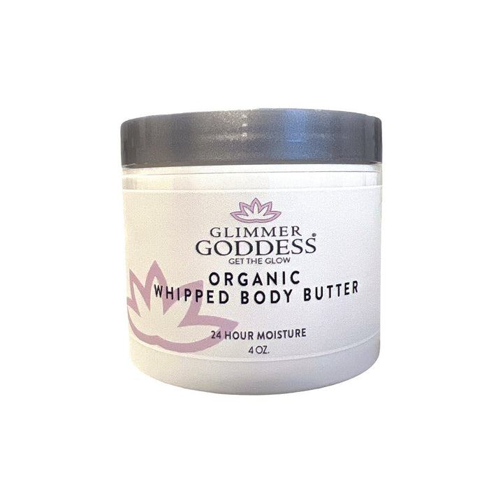 Organic whipped shea body butter in a 4 oz travel size jar with a creamy texture.