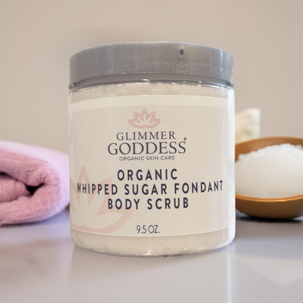 Organic whipped sugar body scrub with a creamy, exfoliating texture.