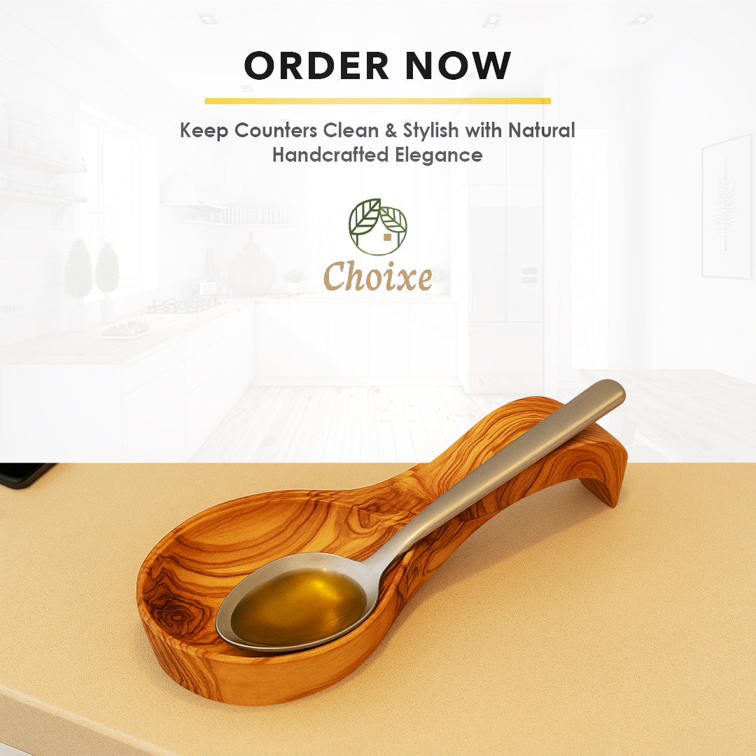 Olive wood spoon rest with a handcrafted Mediterranean design, featuring a smooth, polished wood surface and curved shape.