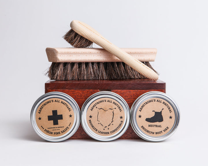 Cigar Box Shoe Shine Kit with brushes and wax in a reclaimed cigar box.